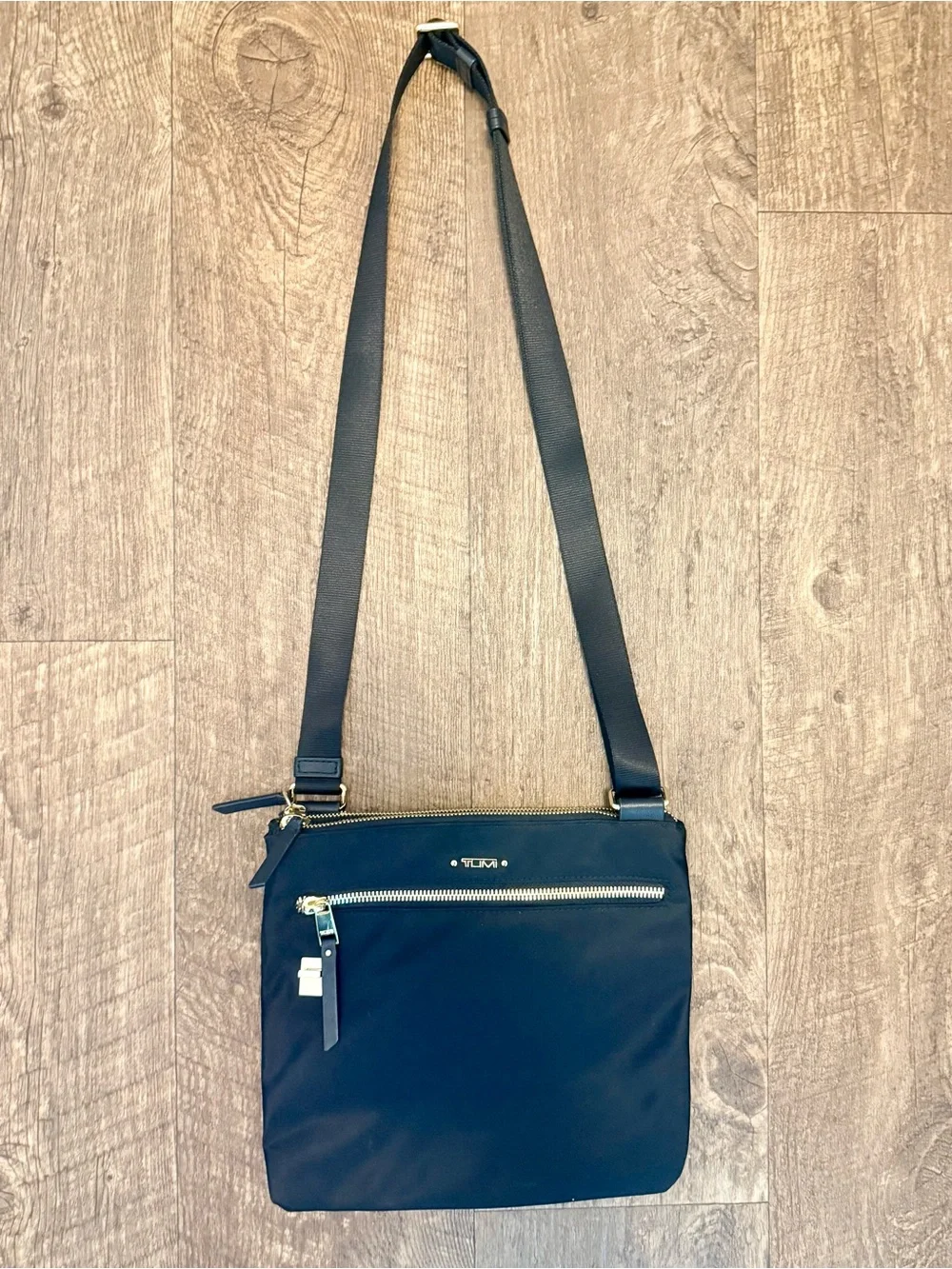 Tumi secure wear gold